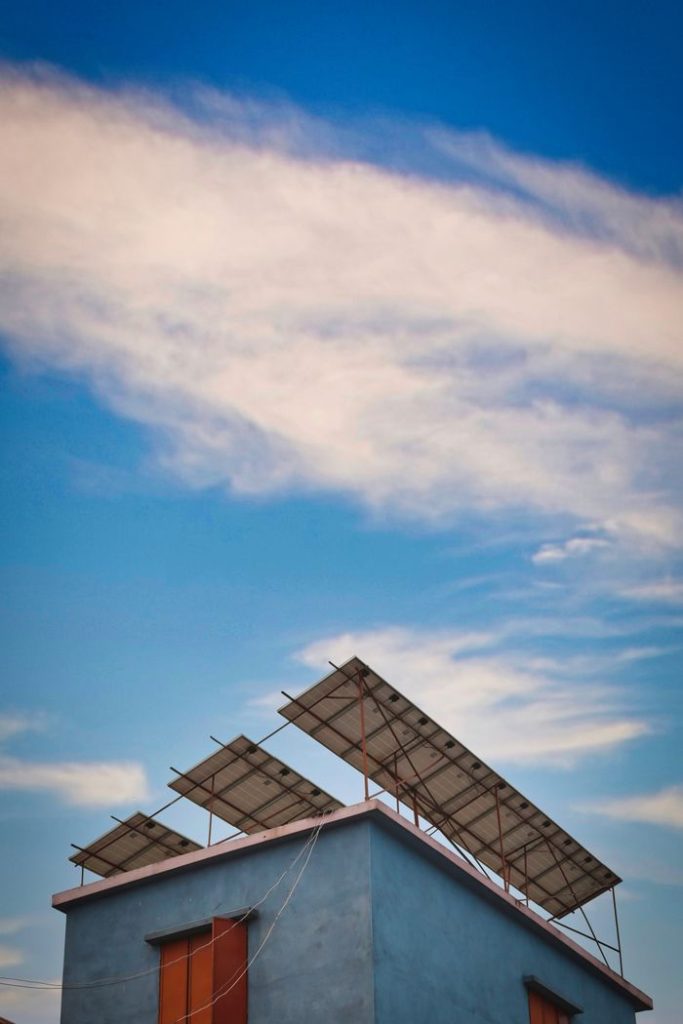 Crafting Captivating Headlines: Your awesome post title goes here Solar panels mounted on a rooftop against a clear blue sky.
